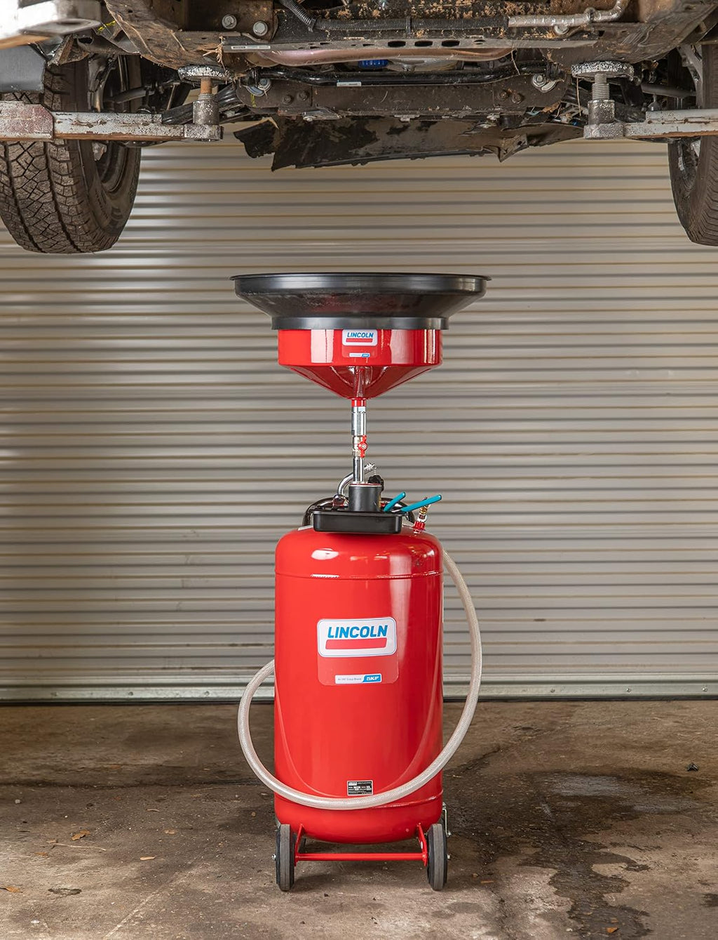Lincoln 3635 Pneumatic 25 Gallon Pressurized Fluid Drain and Evacuation Tank, 51'-76' Adjustable Funnel Height, Heavy-Gauge Steel, 18' Offset Bowl with Metal Filter Screen, 4' Swivel Casters, Red