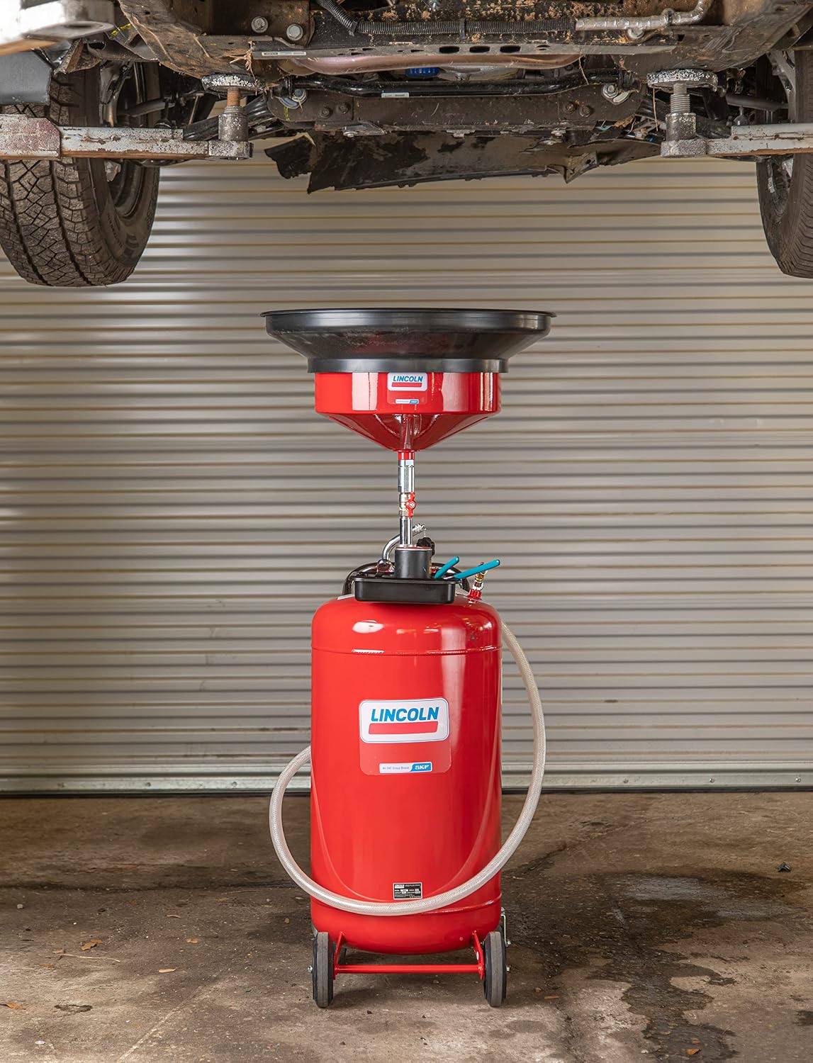 Lincoln 3635 Pneumatic 25 Gallon Pressurized Fluid Drain and Evacuation Tank, 51'-76' Adjustable Funnel Height, Heavy-Gauge Steel, 18' Offset Bowl with Metal Filter Screen, 4' Swivel Casters, Red