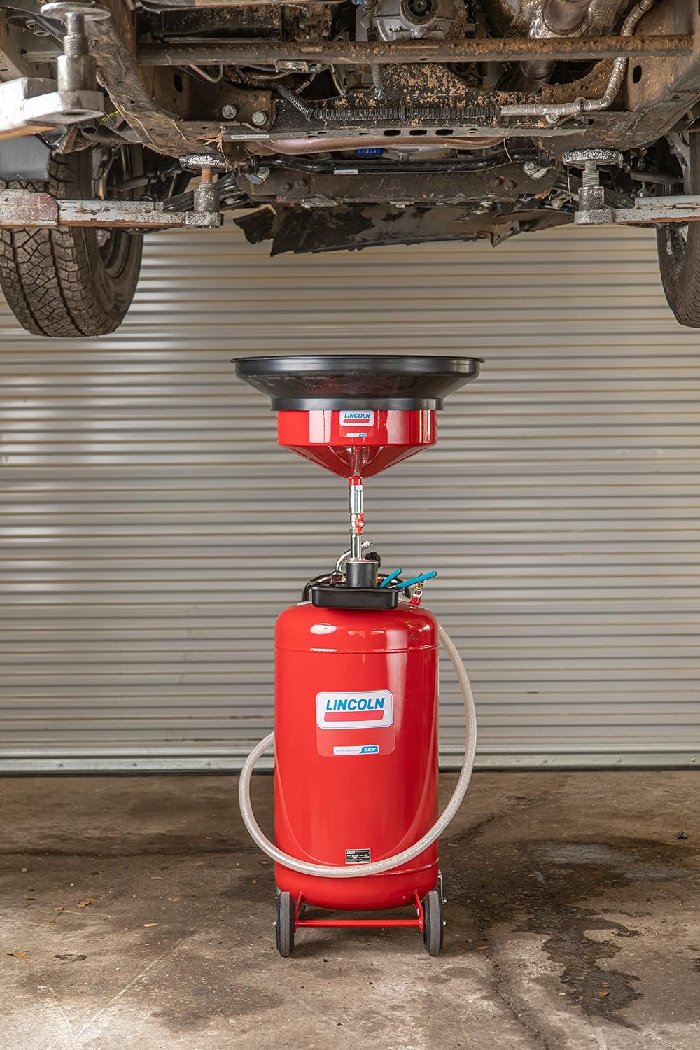 Lincoln 3635 Pneumatic 25 Gallon Pressurized Fluid Drain and Evacuation Tank, 51'-76' Adjustable Funnel Height, Heavy-Gauge Steel, 18' Offset Bowl with Metal Filter Screen, 4' Swivel Casters, Red